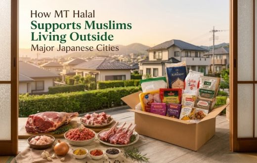 A delivery box filled with Halal groceries and assorted fresh meat cuts arranged on a wooden floor in front of a scenic residential view.