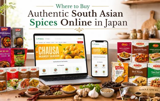 A variety of authentic South Asian spice packets from brands like National, Shan, and Ahmed Foods arranged on a table with a laptop and smartphone displaying an online grocery store.