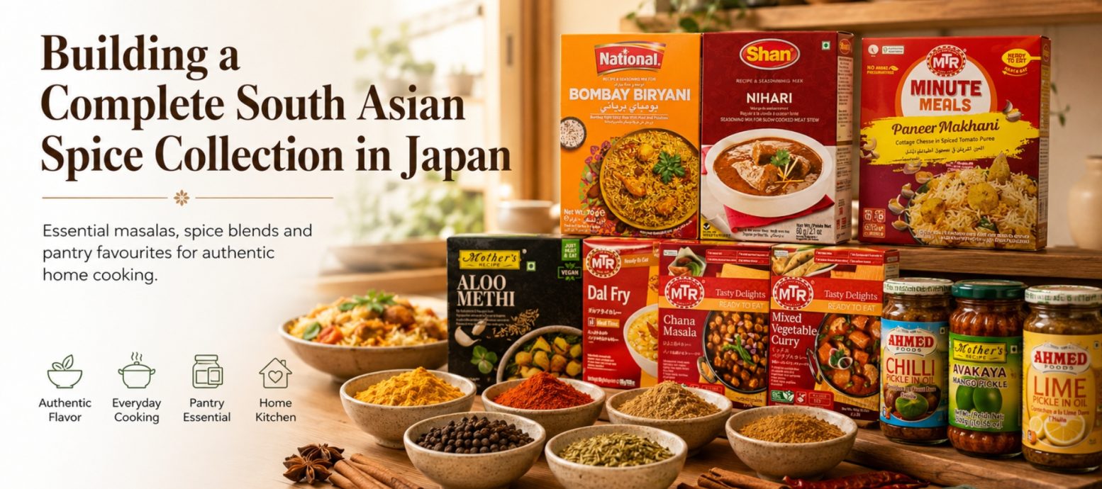 A curated collection of essential South Asian pantry items, including Shan and National masala packets, MTR ready-to-eat meals, and Ahmed Foods pickles, organized on a kitchen counter in Japan.