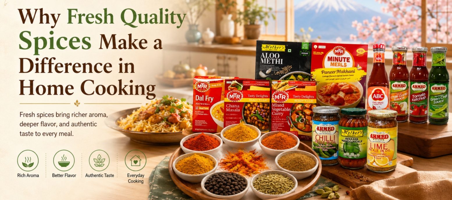 A variety of MTR ready-to-eat meals, Ahmed Foods pickles, and various fresh spices in bowls arranged on a table, highlighting the importance of quality ingredients in home cooking, with Mount Fuji in the background.